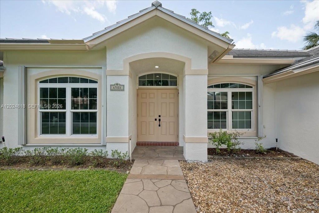 Photo of 6508 NW 54th Ct, Lauderhill, FL 33319 (MLS # A12024818)