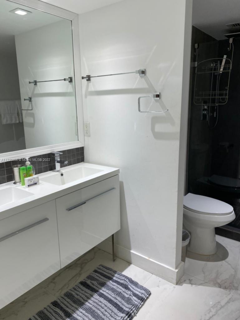 RONEY PALACE CONDO - Residential Lease