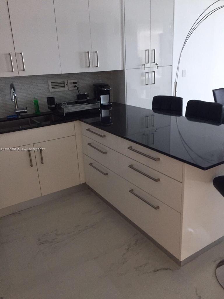 RONEY PALACE CONDO - Residential Lease