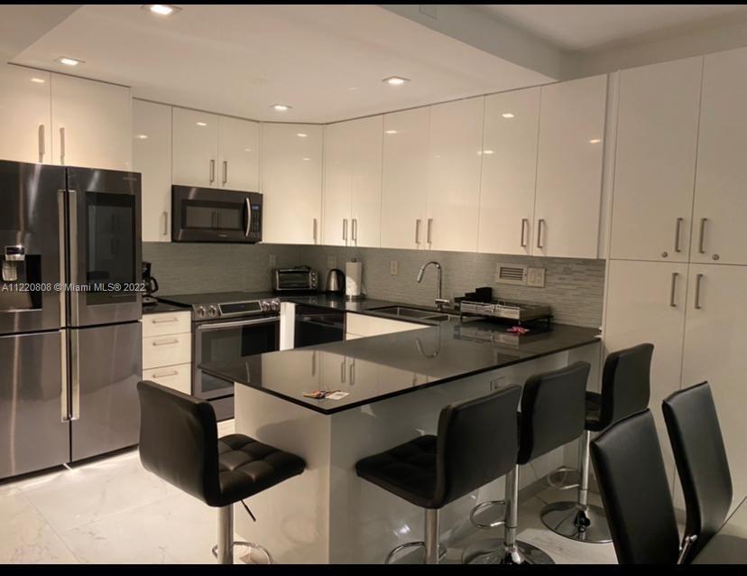 RONEY PALACE CONDO - Residential Lease