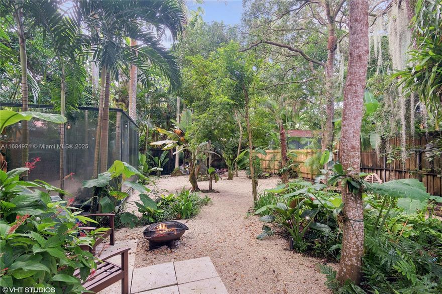 Charming 3/2 bungalow-style home situated on famous Irvington Avenue. One of the most desirable tree lined dead-end streets in Coconut Grove with a large community park in the center and no through traffic that allows for walking or biking to restaurants and parks.
Spacious living/dining room features a working fireplace. Original wood floors in part of the house.
Brand new (2024) roof and high impact windows throughout the house. Master room and master bathroom part of newer addition. Entire home freshly painted with new front fence. Large, beautifully landscaped yard with plenty of room for a swimming pool. Separate, barely visible structure that could be used as a recreation room/office/gym or studio.