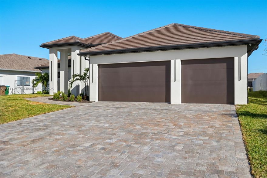 Seller is motivated bring offers!!!    Welcome to your dream home in Cape Coral! This stunning new construction offers luxury living with breathtaking waterfront views. Featuring 3 spacious bedrooms, an office, and 3 elegant bathrooms, every detail is designed for comfort and style. High ceilings, modern finishes, and abundant natural light enhance the open concept living space, which flows into a gourmet kitchen with quartzite countertops and stainless-steel appliances. Step outside to your private oasis with a pool overlooking the canal. With Gulf access, enjoy boating and fishing from your backyard.  Additional features include spacious 3 car garage.  Conveniently located near top schools, dining, and shopping, this waterfront masterpiece is must-see.   No Flood Insurance is required!!!
