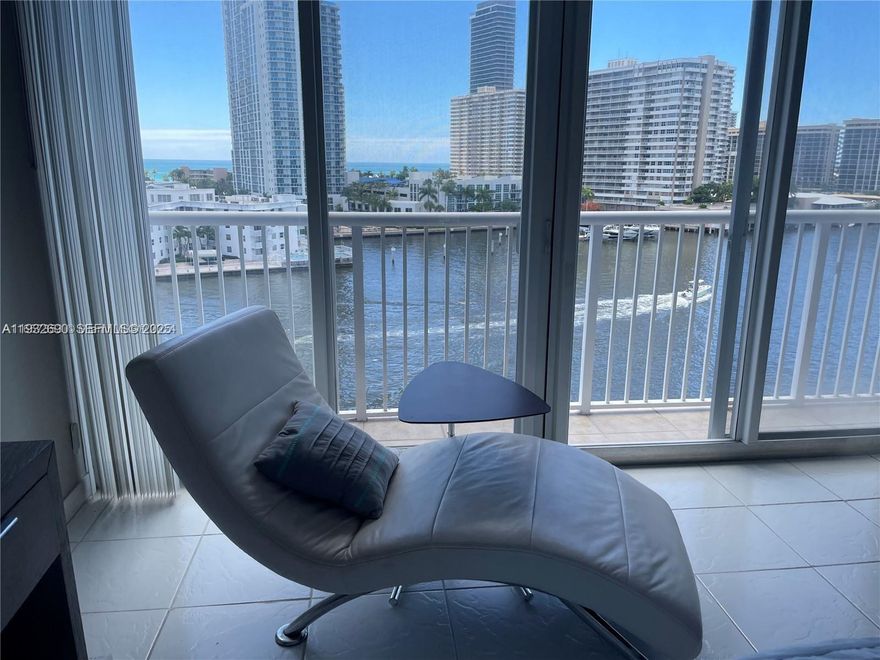 Imagine a spacious 2-bedroom, 2-bathroom condo with breathtaking water views. The open-concept living and dining area features large, sliding windows, allowing natural light to flood the space and offering unobstructed vistas of the ocean waves. The kitchen is modern and sleek, complete with granite countertops, stainless steel appliances. Both bedrooms are generously sized, with the master bedroom boasting an en-suite bathroom. The second bedroom is equally inviting, located conveniently near the second bathroom, which is fitted with modern fixtures and a spacious shower. A private balcony extends from the living room, providing the perfect spot for morning coffee or evening relaxation while taking in the tranquil water views.