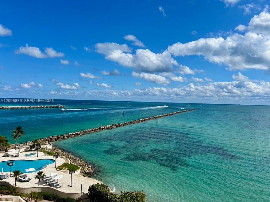 For the first time, this magnificent and much sought after Fisher Island residence is now available for sale. Featuring 6 bedrooms, 5 bathrooms floor plan. Spanning 7,304 square feet, this expansive interior is a masterclass in sophistication, created by a world-renowned interior designer. An additional 1,400 square feet of wrap terraces offers the perfect vantage point for sunrise and sunsets.  Situated on a high floor, double elevator entry. Residence offers a lifestyle of absolute privacy and architectural mastery. Custom Craftsmanship: Superb finishes and intricate custom millwork define this home and can be found throughout. limestone flooring • Chef’s Sanctuary: This home also boasts a custom-designed culinary kitchen equipped for high-level entertaining. •Safety: Recently upgraded with top-tier PGT hurricane-proof windows and doors (by Peet's) blending complete peace of mind with absolute aesthetic elegance. This home enjoys unobstructed, dual-exposure views that capture
the best of both worlds with views of the Atlantic Ocean and iconic Miami City Skyline.   3 assigned covered garage automobile parking spaces for 5 cars & access to EV charging,  along with 2 golf carts and 2 golf cart parking spaces and a private climate-controlled storage room with cedar closet. Antique lightings excluded.
• The Ultimate Nautical Addition: For the yachting enthusiast, a 60-foot marina slip located
within the exclusive Fisher Island Marina is available for separate purchase