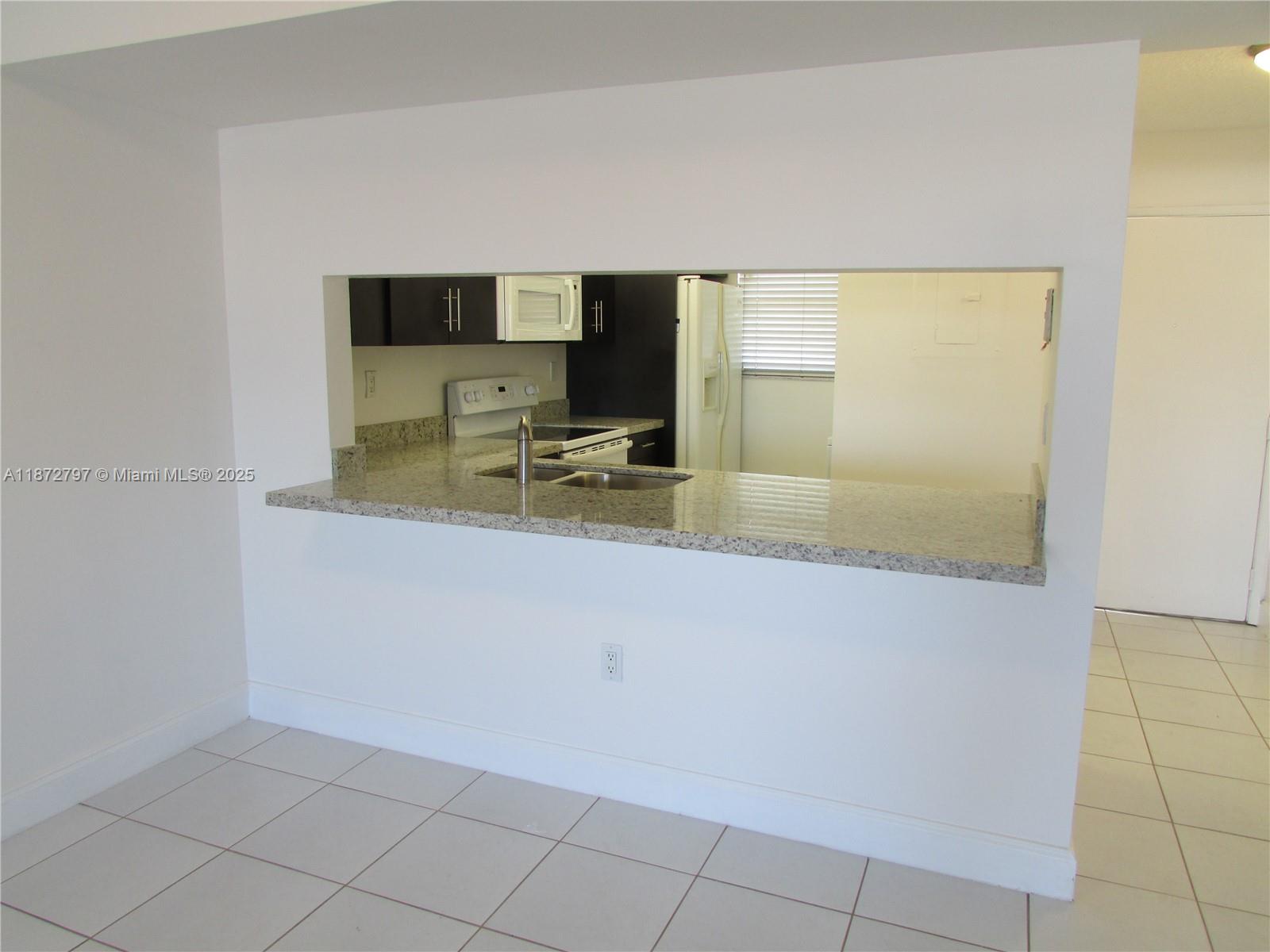 10315 NW 9th St Cir 407-14