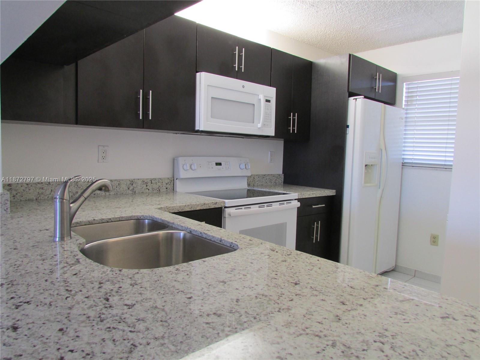 10315 NW 9th St Cir 407-14