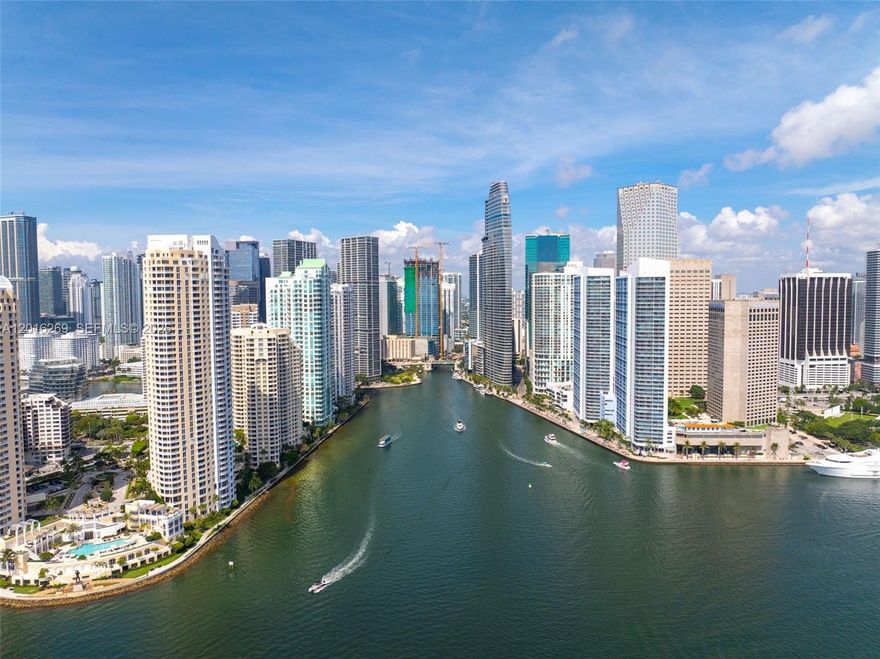 A rare high-end loft with 24-foot ceilings in the heart of Downtown Miami, directly across from Bayfront Park and Biscayne Bay, surrounded by premier luxury developments including Aston Martin Residences.

This dramatic double-height residence delivers a true loft experience defined by volume, light, and architectural presence  a scale that is rarely available in the Downtown market. Fully designed by a professional design studio and offered turnkey, the space reflects a refined, modern high-end lifestyle.

The open living area flows into a sleek Italian-imported kitchen featuring top-tier appliances and custom finishes. A statement bar, also imported from Italy and complemented by a built-in wine cooler, creates a sophisticated focal point ideal for entertaining.

Bathrooms are finished with high-end Italian materials, offering a clean, contemporary, spa-like feel. Each bedroom includes spacious walk-in closets, combining functionality with elevated design.

The residence includes two assigned parking spaces  a major advantage in Downtown Miami, along with a large private storage unit under A/C, an exceptionally rare feature that adds real, usable space and long-term value.
Positioned in one of Miami’s most dynamic waterfront corridors, this residence offers immediate access to Bayfront Park, Biscayne Bay, and the city’s top dining, entertainment, and cultural destinations.