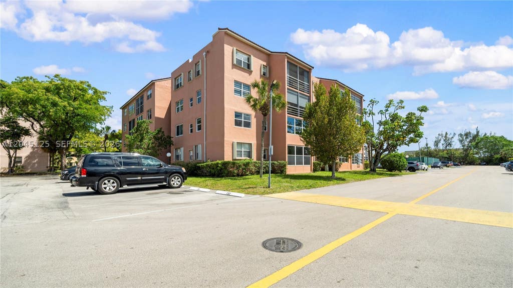 Photo of 2861 Somerset Dr #301, Lauderdale Lakes, FL 33311 (MLS # A12045125)