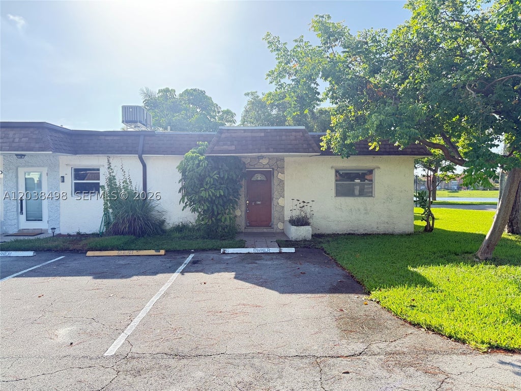 Photo of 417 SW Natura Ave #A, Deerfield Beach, FL 33441 (MLS # A12038498)