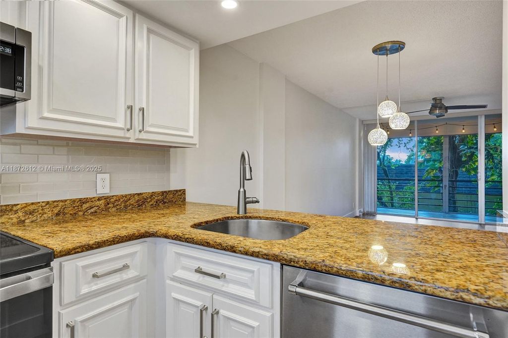 Photo of 119 Royal Park Dr #3B, Oakland Park, FL 33309 (MLS # A11872612)