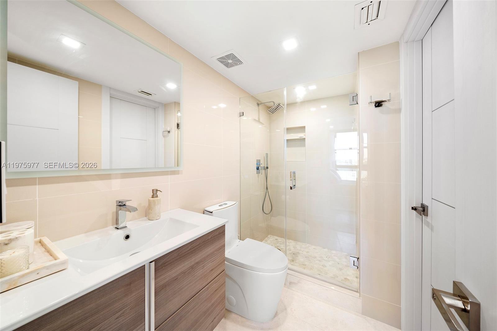 NINE ISLAND AVENUE CONDO - Residential Lease