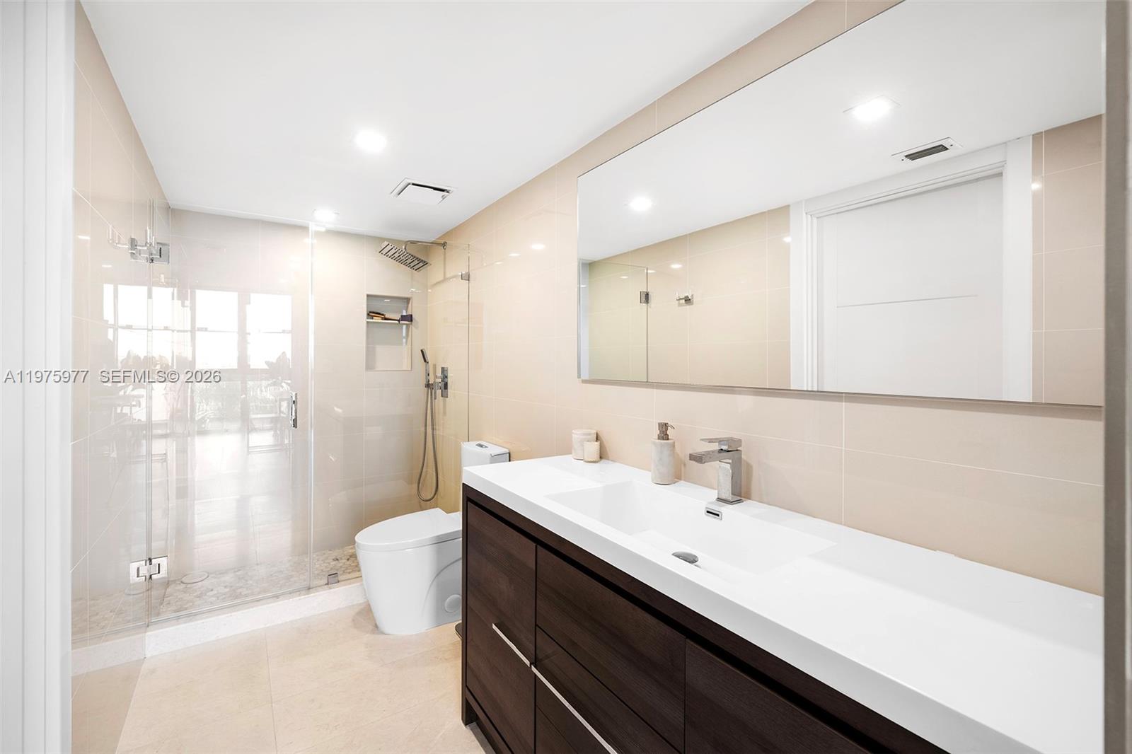 NINE ISLAND AVENUE CONDO - Residential Lease