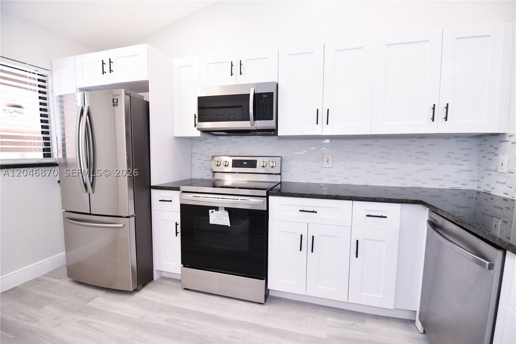 Photo of 2315 SW 22nd Ave #2020, Delray Beach, FL 33445 (MLS # A12046870)