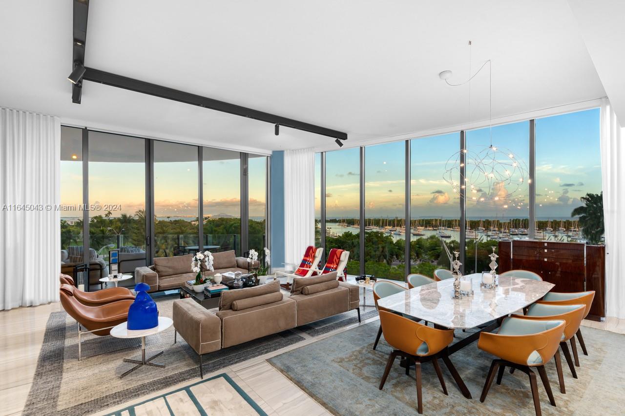 Step into unparalleled luxury with this exquisitely remodeled 4-bedroom, 5-bathroom apartment in a stunning building designed by acclaimed architect Rem Koolhaas. This residence features marble flooring throughout and boasts impressive 12-foot floor-to-ceiling windows that offer abundant natural light and captivating views.The gourmet chef's kitchen, designed by William Sofield, is equipped with top-of-the-line Wolf and Sub-Zero appliances, a gas stove, and a Gaggenau coffee maker. The home also includes his-and-her walk-in closets designed by Mia Cucina and elegant Italian doors. Enjoy the sizable covered outdoor terrace for relaxation or entertaining, and take advantage of the building’s exclusive amenities