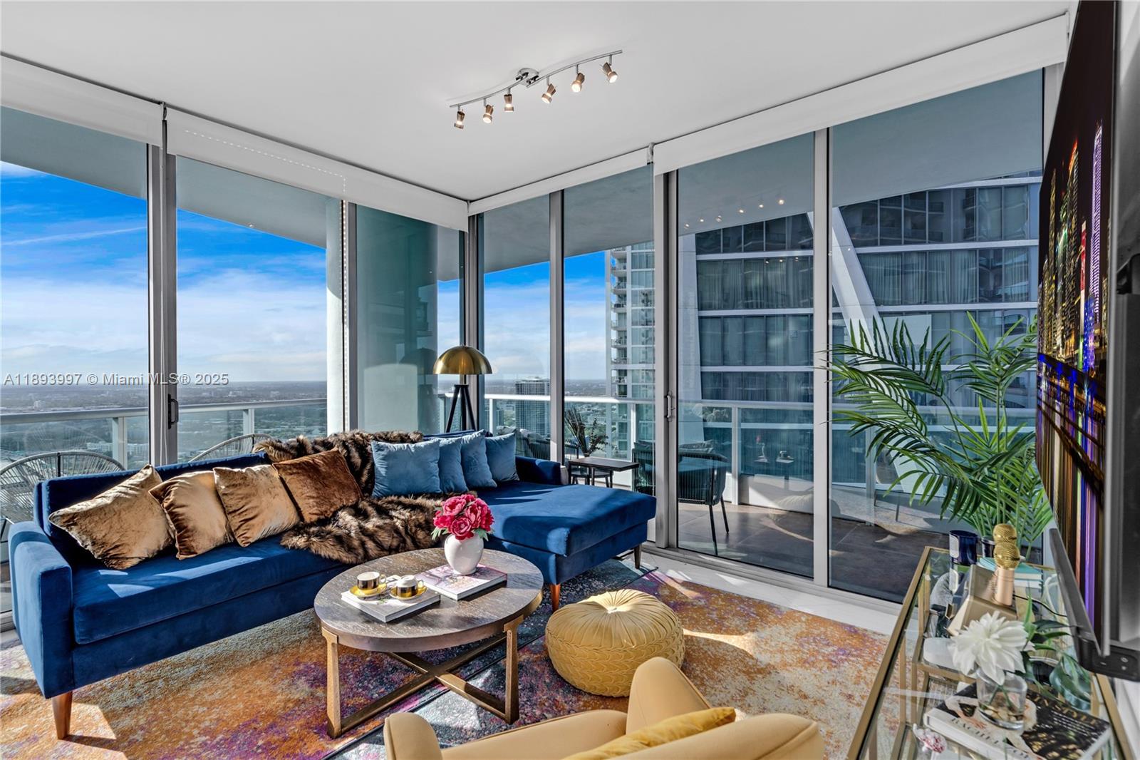 Experience breathtaking panoramic views of Biscayne Bay and Museum Park from this stunning fully furnished corner residence on the 44th floor. Featuring 2 bed/2.5 baths, and 1,237 sq ft of living space + 572 sq ft of outdoor terraces spread across three balconies. Enjoy bright living spaces with floor-to-ceiling windows, and a beautifully designed kitchen with a waterfall marble countertop, Sub-Zero fridge, and Miele appliances. The dining area, elegant living room, and primary suite all open to spectacular views day and night. Residents enjoy full-service luxury amenities including concierge, 24-hour valet and security, spa, fitness center, and two resort-style pools. Available also for seasonal rentals (3-month min). Rates vary by season, inquire with the listing agent for details.