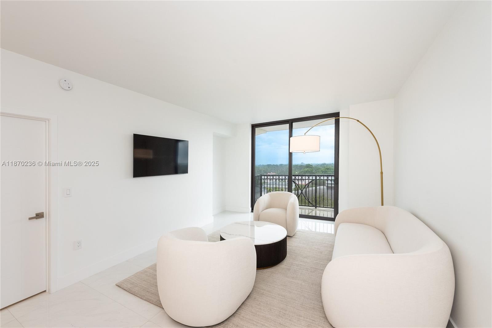 Discover this stunning 2BED, 2BA apartment that combines modern living with serene luxury. Bathed in natural light from its desirable south-facing orientation, this minimalistic oasis features high-end finishes throughout, spacious walk-in closets and top-of-the-line appliances. The smart split floor plan ensures ultimate privacy, ideal for sharing or hosting guests. Enjoy breathtaking green views from its nice balcony, creating a peaceful retreat in the heart of the city. Located just 15-mins away from Miami Intl Airport, this apartment offers convenience alongside relaxation. Revel in the exceptional amenities at Merrick Manor, including a stunning pool, fitness center, and lush landscaped areas.Don’t miss your chance to own this delightful blend of elegance, comfort, and prime location!