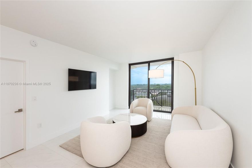 Discover this stunning 2BED, 2BA apartment that combines modern living with serene luxury. Bathed in natural light from its desirable south-facing orientation, this minimalistic oasis features high-end finishes throughout, spacious walk-in closets and top-of-the-line appliances. The smart split floor plan ensures ultimate privacy, ideal for sharing or hosting guests. Enjoy breathtaking green views from its nice balcony, creating a peaceful retreat in the heart of the city. Located just 15-mins away from Miami Intl Airport, this apartment offers convenience alongside relaxation. Revel in the exceptional amenities at Merrick Manor, including a stunning pool, fitness center, and lush landscaped areas.Don’t miss your chance to own this delightful blend of elegance, comfort, and prime location!