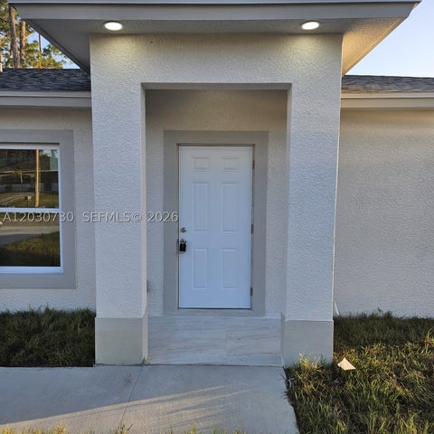 Tiny photo for 1901 W 11th Street, Lehigh Acres, FL 33972 (MLS # A12030730)