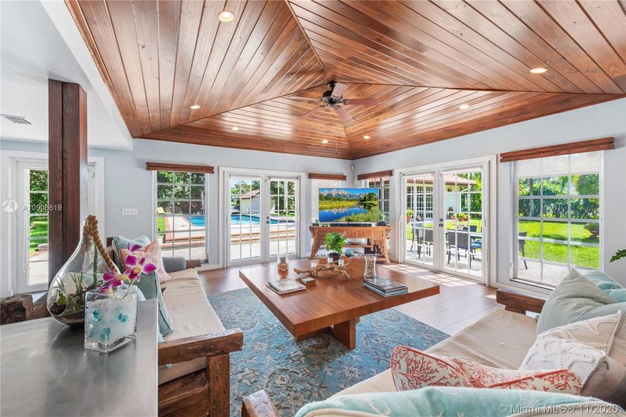 Beautifully remodeled 4,125SF home nestled within a gated, lushly landscaped, 46,348SF lot. Open floorplan perfect for families and entertaining! Formal living room with fireplace, family room with vaulted ceilings, new modern kitchen with top of the line appliances. Split-plan features four bedrooms, three bathrooms including two master suites. Backyard is an oasis with an oversized pool, detached casita and gardens. Huge 748SF, three-room cabana perfect for home office, at-home gym, pool room or additional living space. Two car garage. Located on a quiet street in a convenient location near to Sunset, Dadeland and two A-rated schools.  Fabulous home, amazing backyard.