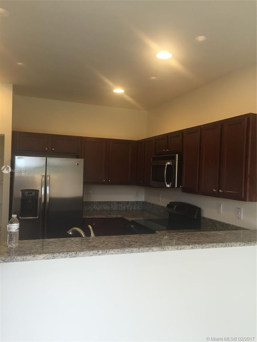THIS BEAUTIFUL VILLA-TOWNHOUSE WAS CONSTRUCTED ONLY 2 YEARS AGO - WITH BEAUTIFUL, GREEN ZONES AND PRIVILEGED COMMUNITY. VERY CLOSE TO THE TURNPIKE EXPRESSWAY, MALLS, BANKS, AND EXCELLENT SCHOOLS. TILE THROUGHOUT THE FIRST FLOOR, CARPET ON THE SECOND FLOOR. 2 STORIES - 3 BED/2.5 BATH.  CHILDREN'S PLAY AREAS. STAINLESS STEEL APPLIANCES. BACK PATIO.
