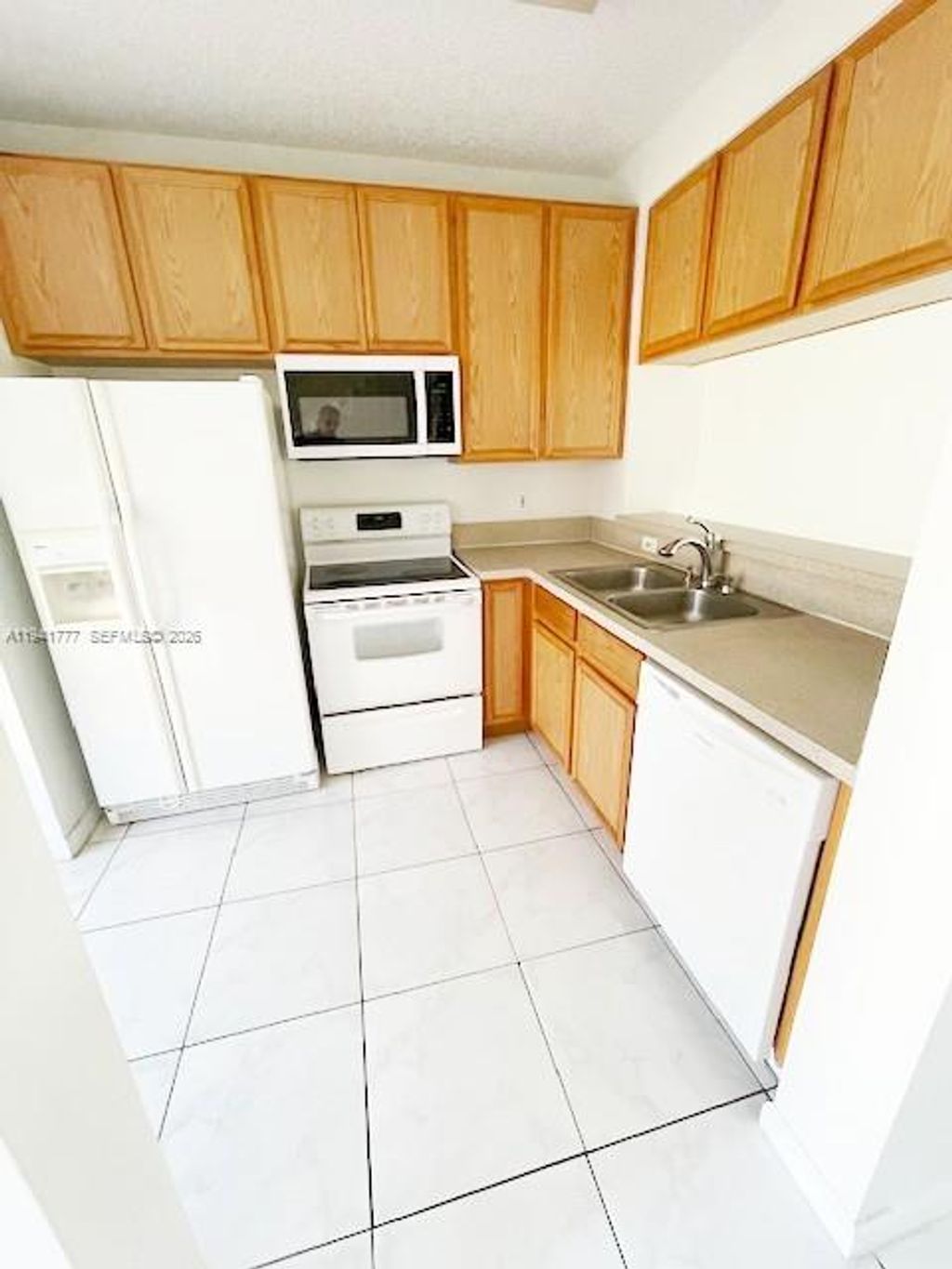 Photo of 5230 Palmbrooke Cir #-, West Palm Beach, FL 33417 (MLS # A11941777)