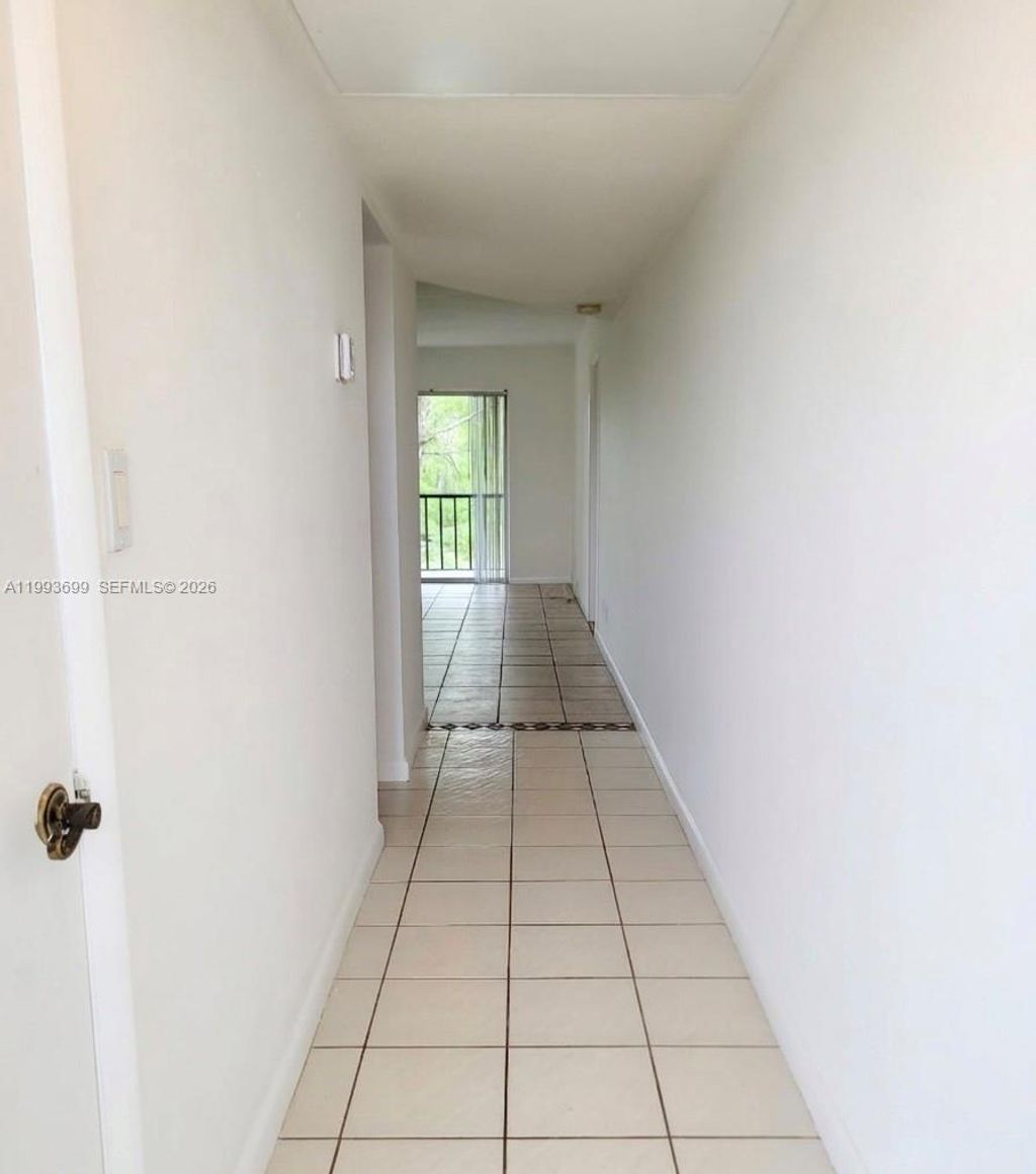Photo of 7900 S Colony Cir S #303, Tamarac, FL 33321 (MLS # A11993699)