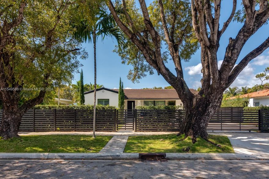 Step inside this new gated lush private oasis on one of the largest lots in the exclusive Roads neighborhood. Actual living area just less than 3000 sq ft. The entire home has been renovated from top to bottom down to the studs with completion in 2020. No expense has been spared. New roof, plumbing, electric, tankless hot water heater, salt water pool, turf putting green, pure water drinking system, built out closets, new ACs, new pool heater, private fenced property around entire perimeter. Everything is new. Professional landscaping allows for the utmost of privacy, huge yard in front and back. Minutes from the finest restaurants in South Florida. Conveniently located less than 5 minutes from Brickell and Downtown. Centrally located close to Coral Gables, Coconut Grove, and Key Biscayne.
