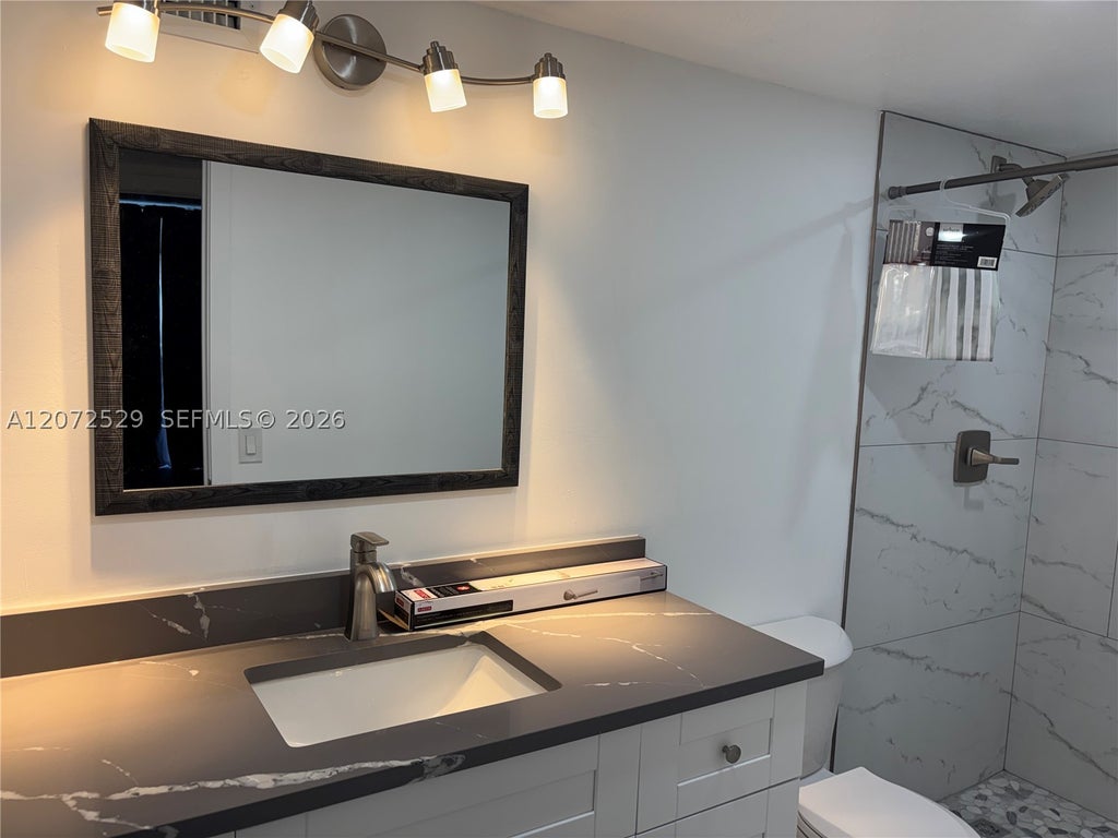 Photo of 701 Three Islands Blvd #320, Hallandale Beach, FL 33009 (MLS # A12072529)