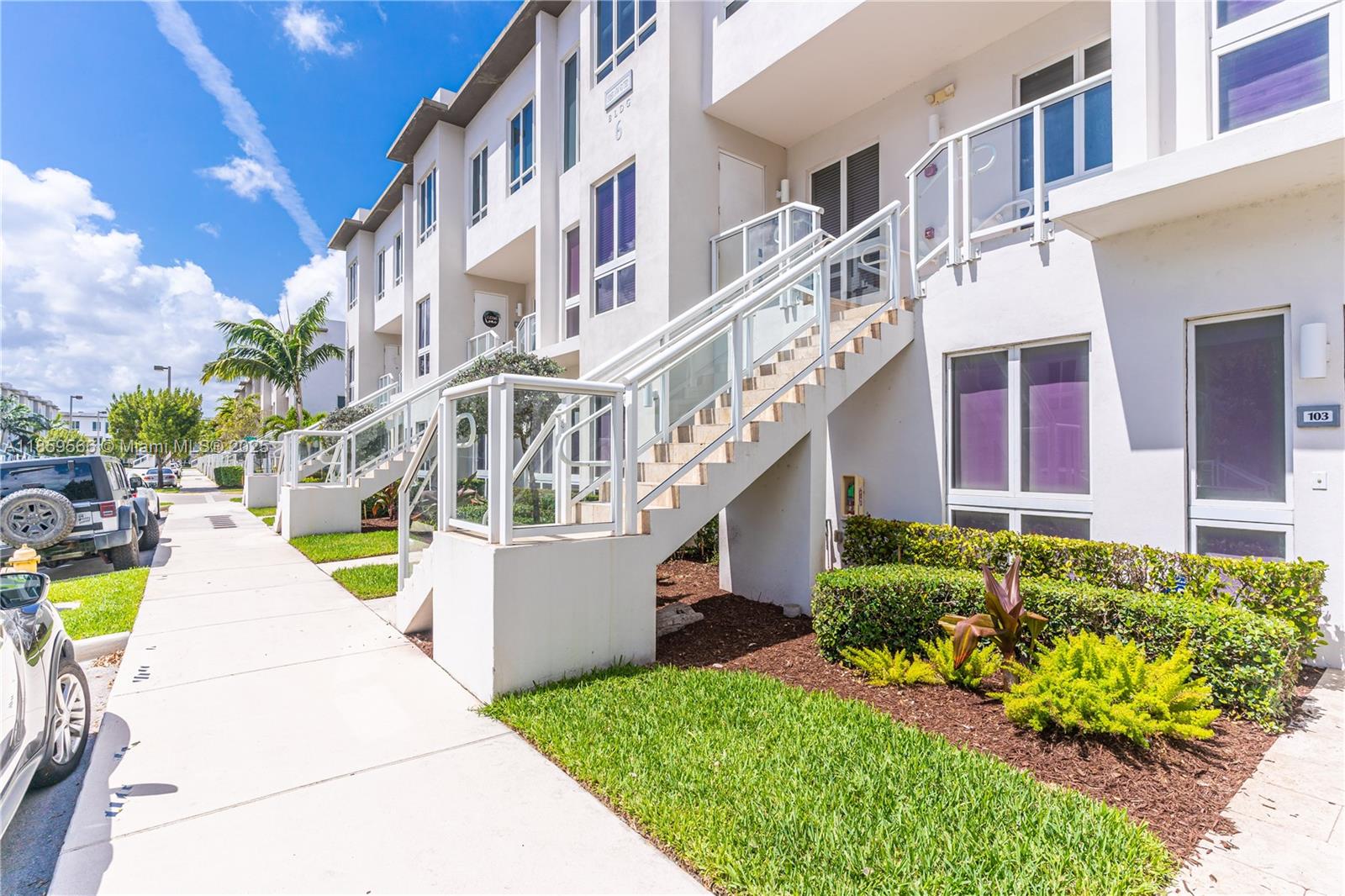 Discover modern living in this beautifully appointed 2-story condo located in the desirable Landmark community. Featuring 3 spacious bedrooms and 3 full bathrooms, this home boasts sleek modern finishes, porcelain tile flooring on the main level, and warm vinyl flooring upstairs. The open-concept kitchen offers contemporary cabinetry, stainless steel appliances, and quartz countertops. Enjoy the convenience of a 1-car garage and the perfect location just steps from the resort-style clubhouse with pool, fitness center, and more. Landmark at Doral offers exceptional amenities and a prime location near top-rated schools, shopping, dining, and major highways.