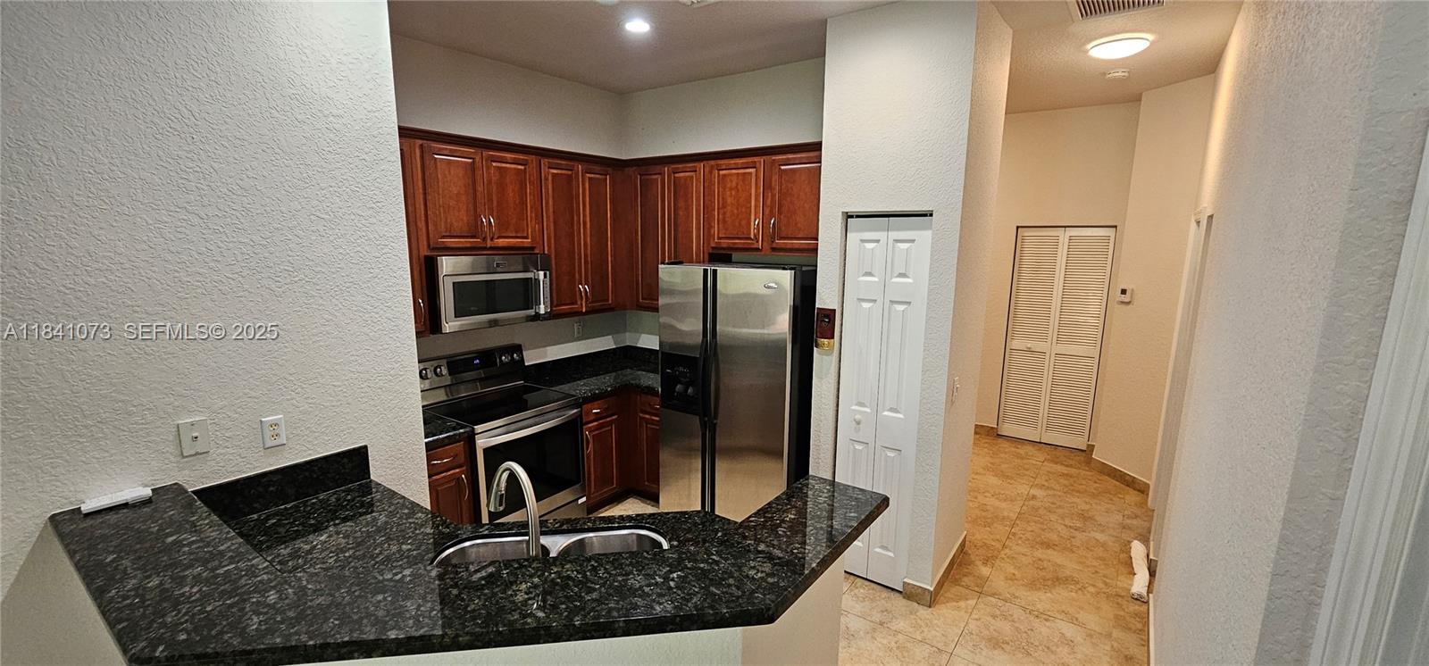 LEGENDS AT THE GARDENS CO - Residential