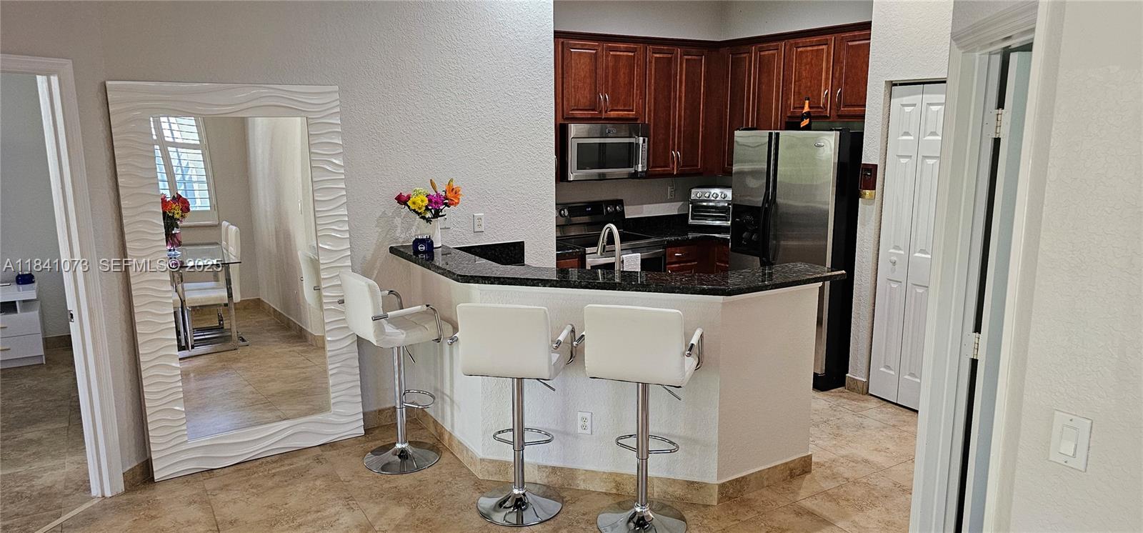 LEGENDS AT THE GARDENS CO - Residential