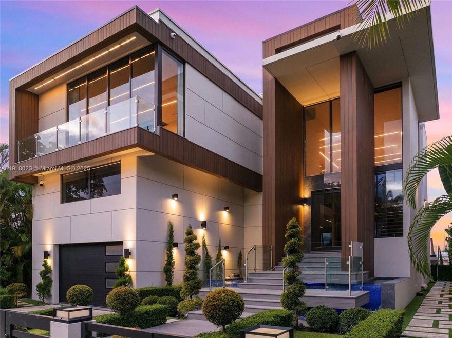 Belle Meade's newest masterpiece has arrived. With over 50 feet on the water, this 2023 build redefines luxurious living with its sharp architecture and unbelievable lineup of extraordinary features. Enjoy your private boat dock, wine cellar, movie theater, floating infinity pool, and state-of-the-art finishes. The soaring ceilings and massive windows frame your picture-perfect views and simultaneously allow the home to fill with natural light throughout the day. The blended use of glass, stone, ceramic, and wood accents in the interior spaces and living areas are immaculate. Upstairs the bedrooms are oversized. All with en-suite bathrooms and custom walk-in closets. The primary looks out on the water, with a floating tub and glass shower. With 10-foot sliding doors leading to the summer kitchen, the home embraces true indoor-outdoor living wrapped in luscious privacy landscaping. The house is equipped with a 2 car garage, and a lift. Gated community.