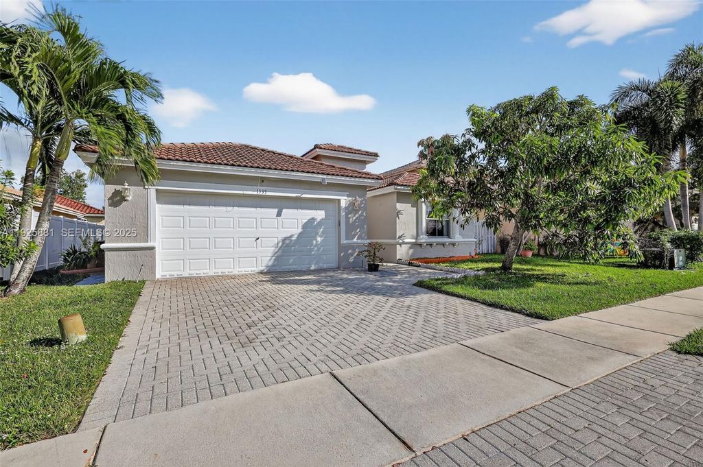 Photo of 1535 SW 187th Ave, Pembroke Pines, FL 33029 (MLS # A11925881)