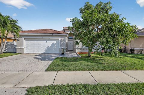 Photo of 1535 SW 187th Ave, Pembroke Pines, FL 33029 (MLS # A11925881)