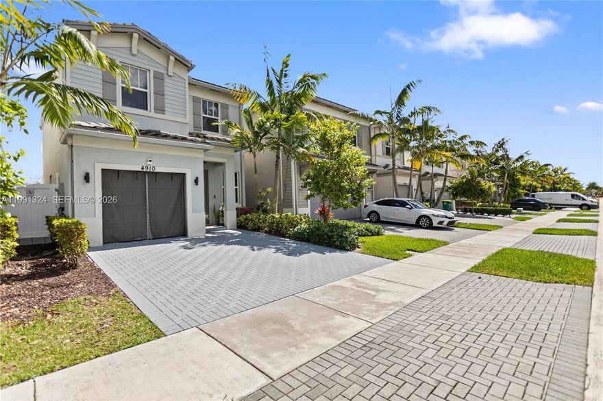 Stunning waterfront home in the desirable Hidden Trails Neighborhood in Tamarac. Built in 2021 and upgraded throughout ,this modern single -family home features hurricane-impact windows and doors. Experience the perfect blend of elegance and comfort in this waterfront home. Live the relaxed South Florida lifestyle in this this value-packed 3 bedrooms  and 2.5 baths. Enjoy breathtaking water views from the backyard, perfect for relaxing or entertaining. HOA under $52.00/month, home conveniently located near the turnpike and I-95. Only 20 minutes away from Downtown Ft Lauderdale. This property was recently built in 2021, sparkling community pool and playground. A true must see!