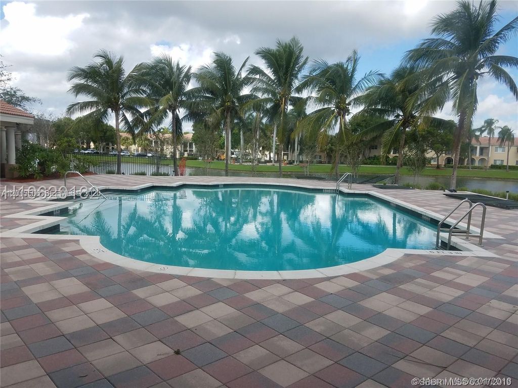 Photo of 2520 Centergate Dr #303, Miramar, FL 33025 (MLS # A12015506)