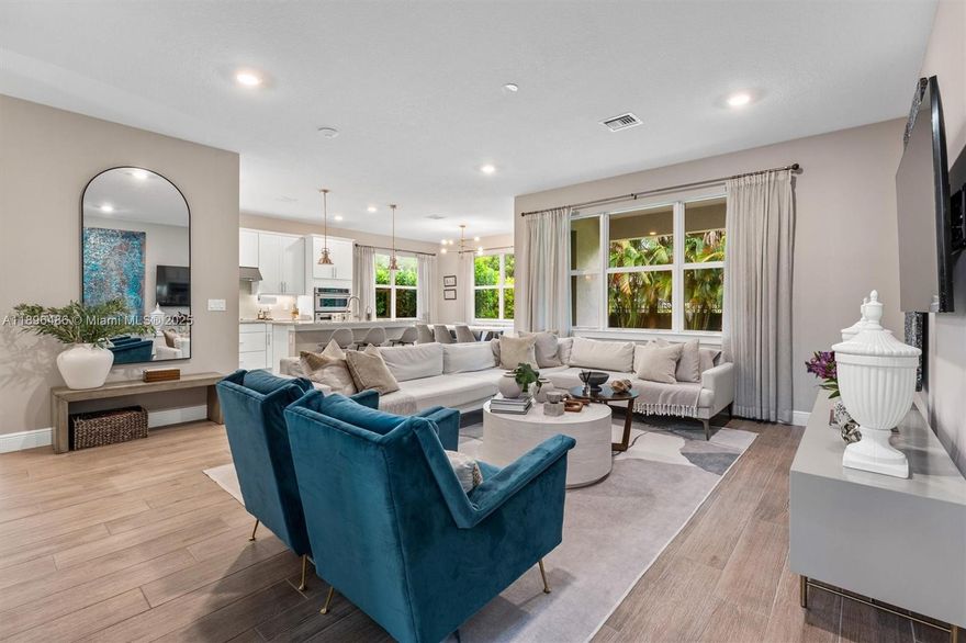 Live the resort lifestyle in this elegant 3BR, 2.5BA home in the gated community of Parkview at Hillcrest. Designed for modern living, the bright open layout features wood-look tile floors, high ceilings, and a chef’s kitchen with quartz counters, soft-close cabinets, stainless steel appliances, and a large island perfect for entertaining. The primary suite offers two walk-in closets and a spa-style bath, while all bedrooms include walk-in closets. Additional highlights include impact windows, a two-car garage, and a private fenced yard with a covered patio. Enjoy a resort clubhouse with fitness center, pool, tennis, pickleball, playground, catering kitchen, bar, multipurpose room, media room, and walking trails—all minutes from I-95, beaches, shopping, and dining.