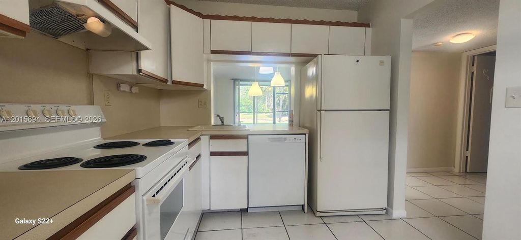 Photo of Coconut Creek, FL 33066 (MLS # A12015894)