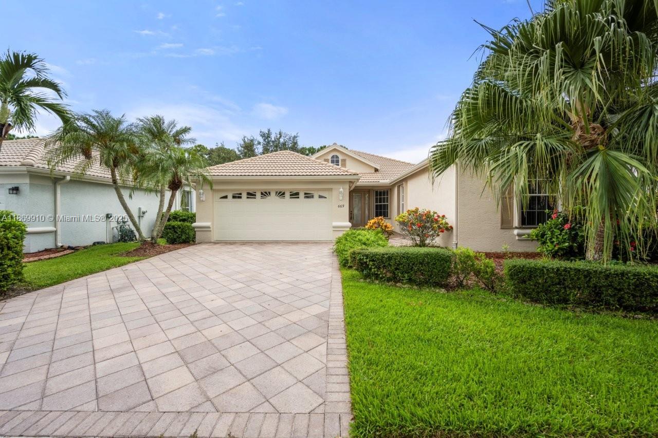 Welcome to this beautifully maintained Oxford model in Lake Charles, St. Lucie West! Built in 2001, this 4BR, 2BA, 2CG home offers 2,250 sq ft living (2,902 total) with a split floor plan, volume ceilings, and ceramic tiled and wood laminate floors. Freshly painted inside/out in 2025. Kitchen features granite countertops, formal dining + eat-in area. Enjoy a large screened patio for outdoor living. Updates include roof pressure cleaned 2025, A/C approx. 7 yrs (serviced), accordion shutters, and electric water heater. Lake Charles offers a manned gate, clubhouse, resort-style pool, pickleball, tennis, playground, and more. HOA includes internet, street lights, and underground utilities.