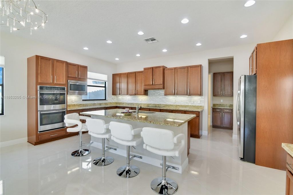 Photo of 12137 Boca Reserve Ln, Boca Raton, FL 33428 (MLS # A11853205)
