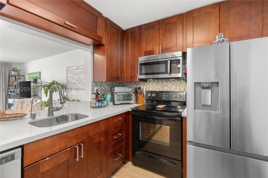 Photo of 4161 NW 90th Ave #206, Coral Springs, FL 33065 (MLS # A12044203)