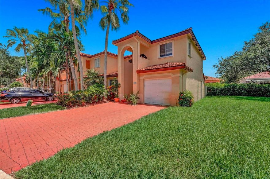 This beautiful and spacious 3 bedroom 2.5 bathroom with 1 car garage townhome is in the sought after guard gated community of Poinciana Parc in Davie! Corner unit with a private and fenced back patio perfect for entertaining and pets. Community has heated pool, play area and is well maintained. Great school district and located close to major highways, restaurants and entertainment!