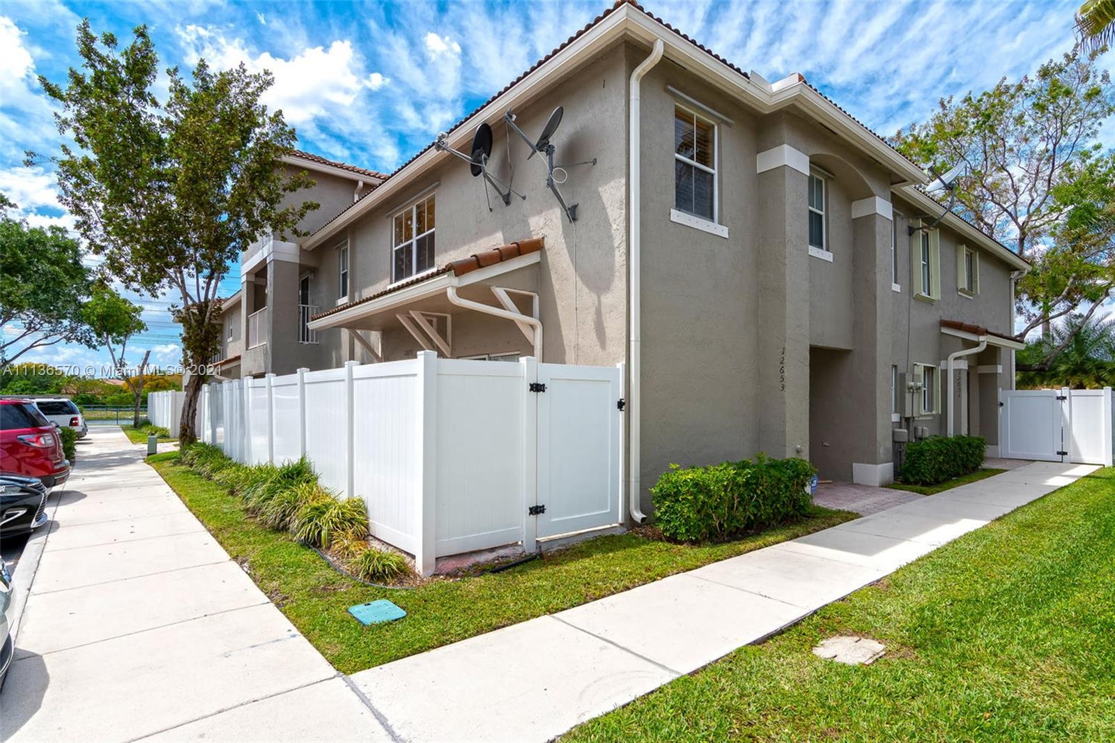 Beautiful and ready to move in a townhouse with plenty of room for a growing family centrally located in Miramar. Amenities include a community pool and plenty of guest parking. Three bedrooms and two bathrooms are found upstairs and half a bath downstairs. Ceramic tile flooring on the first floor and wood laminate on the second floor and stairs. Double doors and size-able walk-in closets in master bedroom with ensuite bathroom. The kitchen has stainless steel appliances, a washer, and a dryer. The fenced patio has room for your barbecue and other items. Come see it soon! It won’t last long.