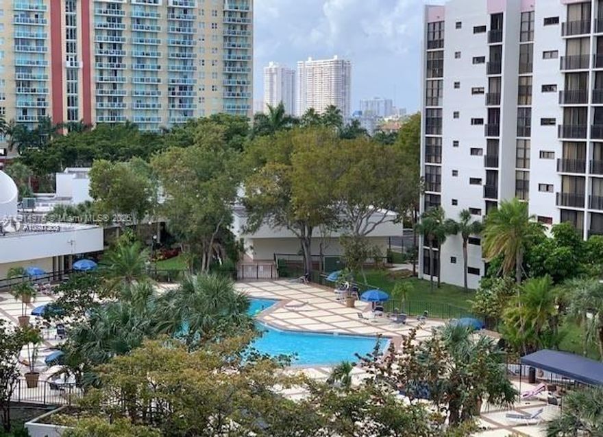 Bright and Updated. Beautifully maintained residence featuring an upgraded kitchen, porcelain tile floors, and generous closet space with extra storage  that belong to the unit.
 Enjoy the convenience of detached garage parking with one assigned spot, resort-style amenities and a prime location just minutes from the beach, shopping, and dining. Ideal for full-time living or investment. No rental restrictions.