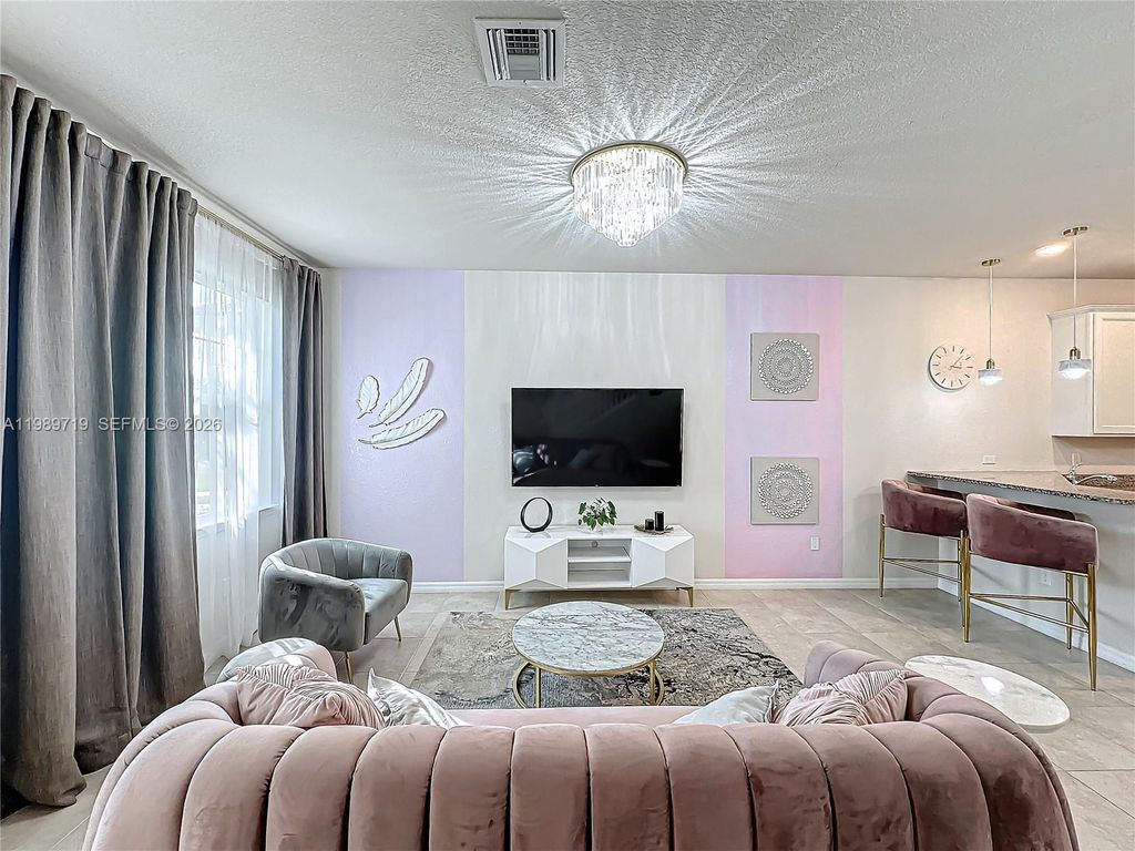 Photo of 1240 Eucalyptus Dr #4, Hollywood, FL 33021 (MLS # A11989719)