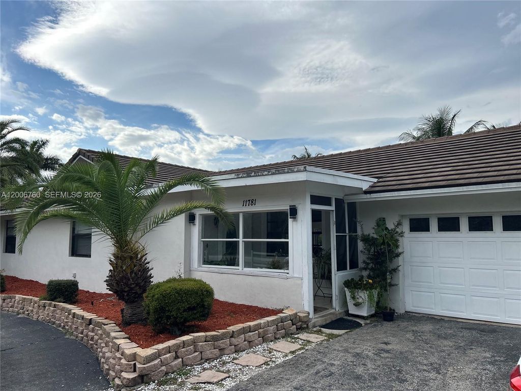 Photo of 11781 NW 14th St, Plantation, FL 33323 (MLS # A12006760)