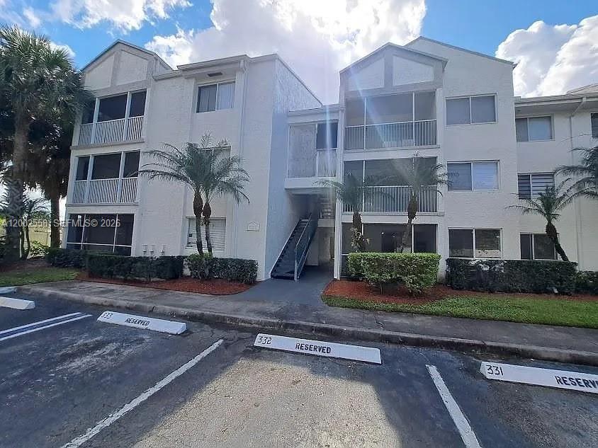 Photo of 5760 Rock Island Rd #330, Tamarac, FL 33319 (MLS # A12002558)