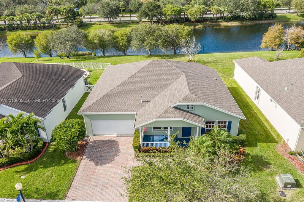Photo of 10671 SW Waterway Ln, Port St Lucie, FL 34987 (MLS # A12013008)