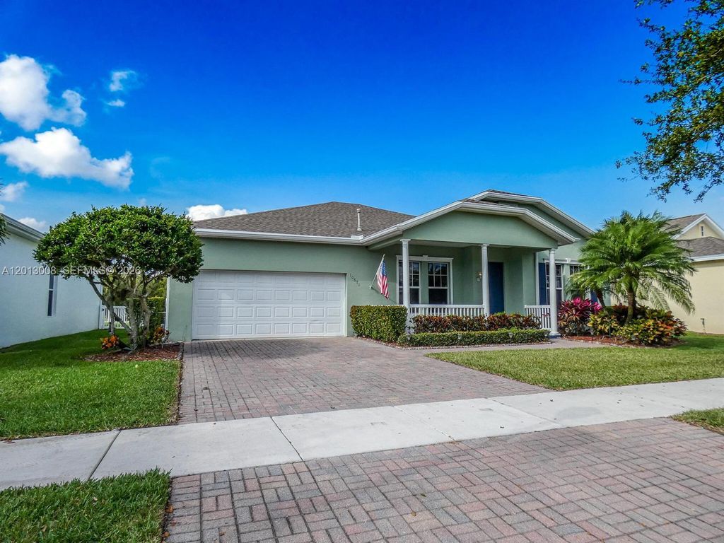 Photo of 10671 SW Waterway Ln, Port St Lucie, FL 34987 (MLS # A12013008)