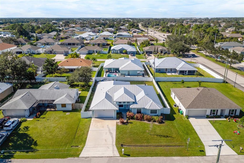 Photo of 4610 SW Quezon St, Port Saint Lucie, FL 34953 (MLS # A11699380)